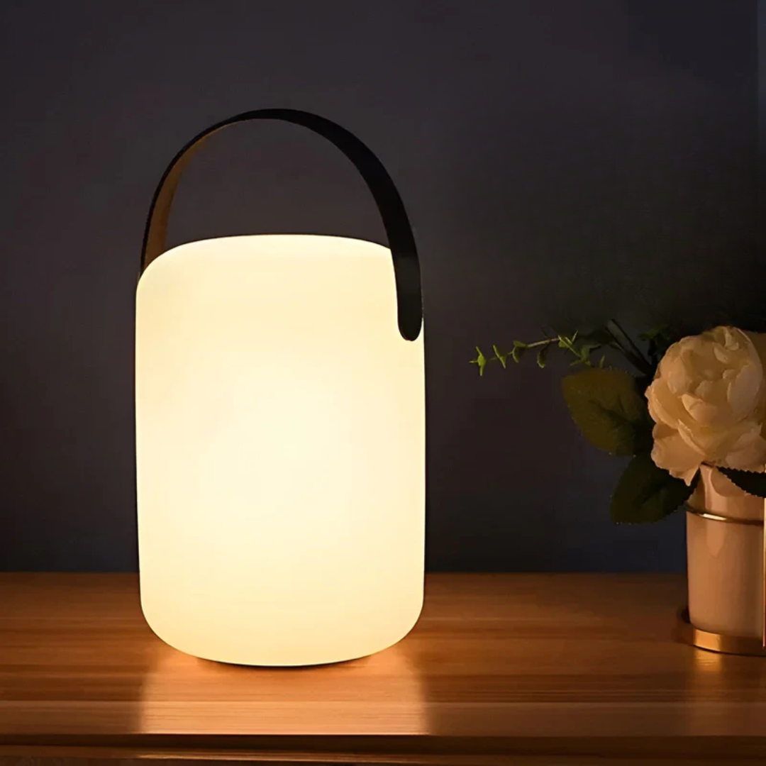Sleek rechargeable wireless table lamp, waterproof. Perfect LED lighting for indoor settings or outdoor patio ambiance.