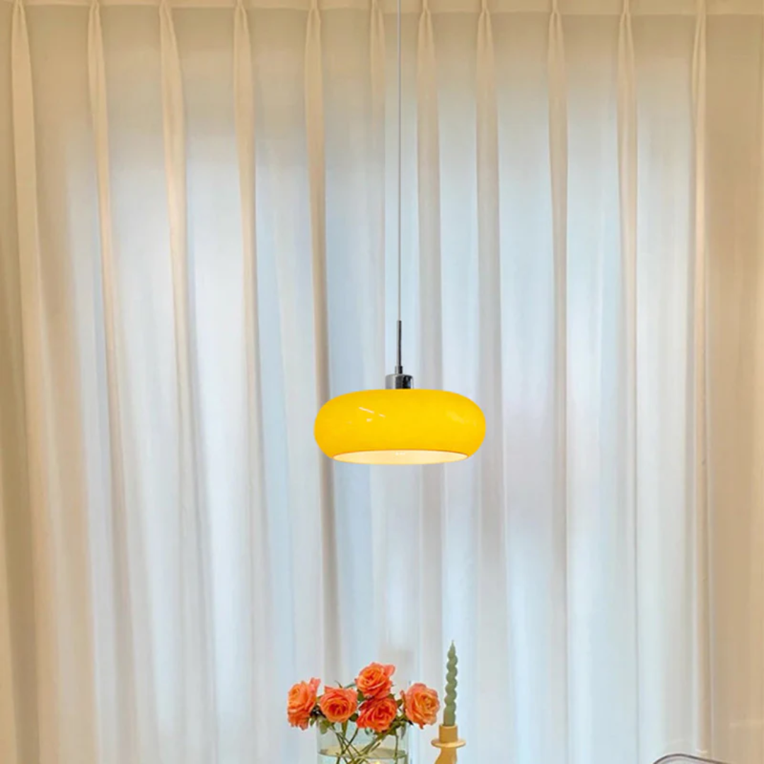 Contemporary RadianceOrb round LED pendant light, adjustable for elegant indoor lighting in bedrooms.