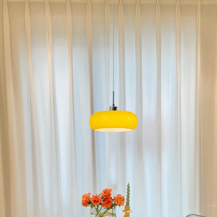 Contemporary RadianceOrb round LED pendant light, adjustable for elegant indoor lighting in bedrooms.