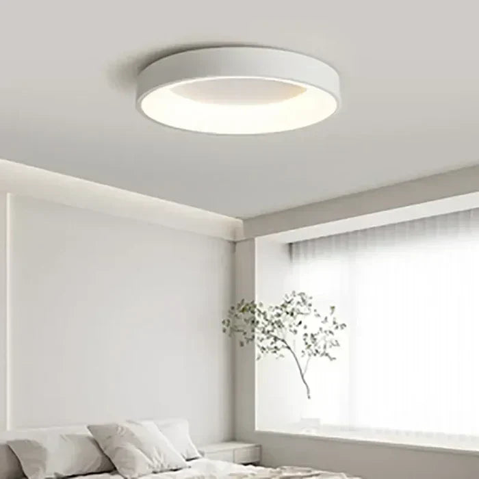 Elegant round LED ceiling light, bringing modern Scandinavian charm to any room. Minimalist design, energy-saving.