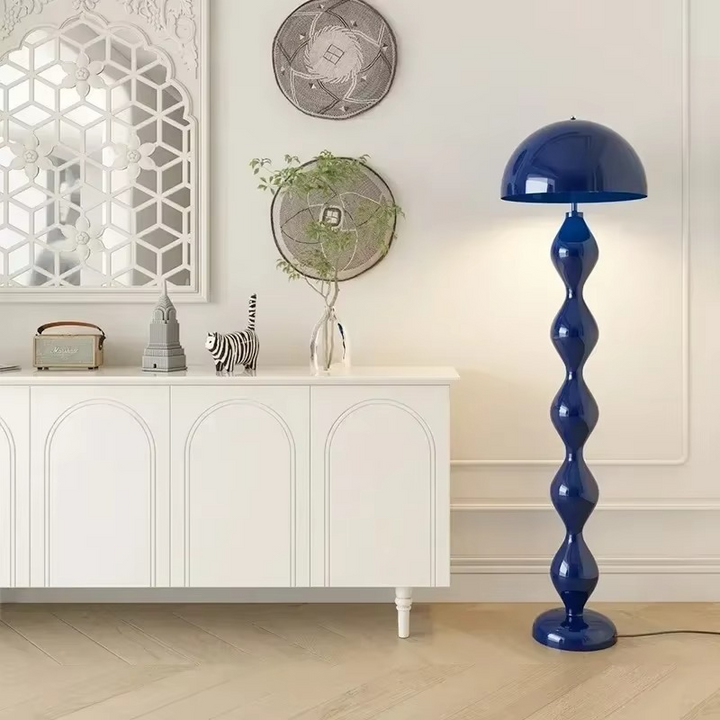 "Modern Scandinavian floor lamp with sleek metal frame and glowing shade in minimalist design for contemporary home decor."