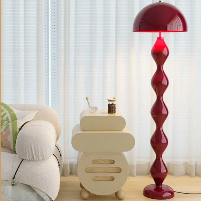 "Modern Scandinavian floor lamp with sleek metal frame and glowing shade in minimalist design for contemporary home decor."