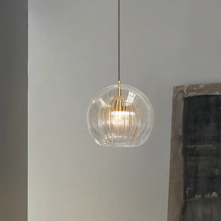 Contemporary LED spherical ceiling light, warm white, enhances any indoor setting.