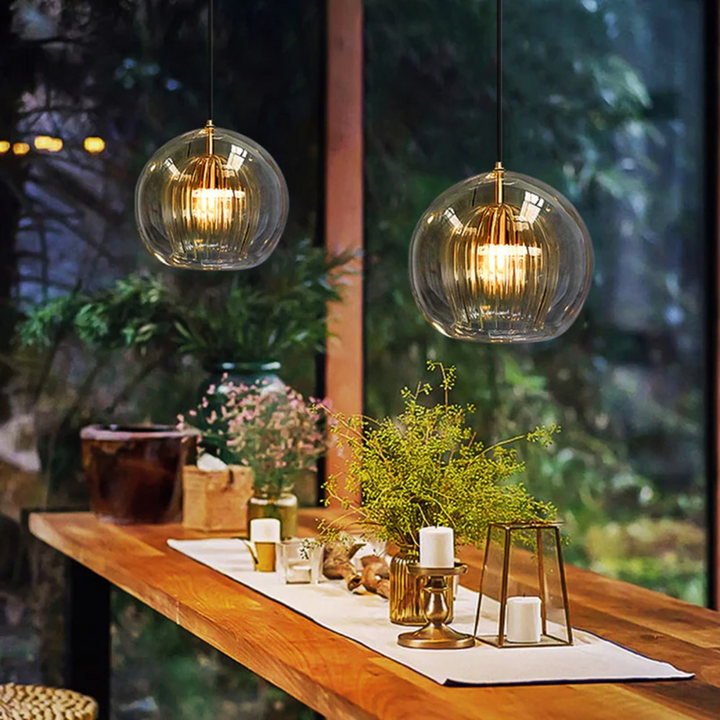 Modern spherical LED pendant light, Aurora Sphere, contemporary home decor accent.