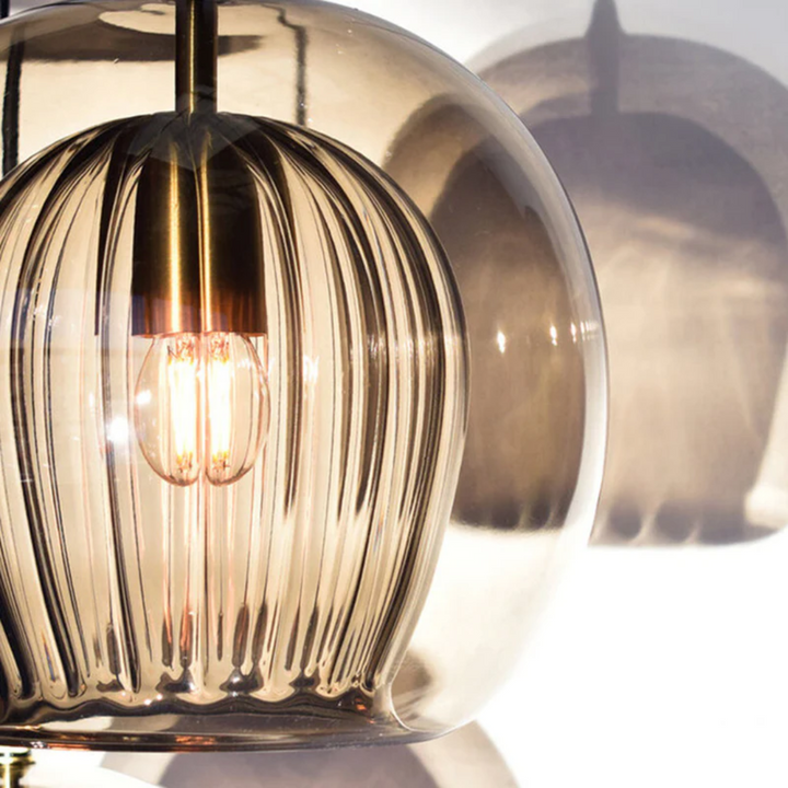 Elegant Aurora Sphere LED pendant lamp; warm white light, perfect ceiling fixture.