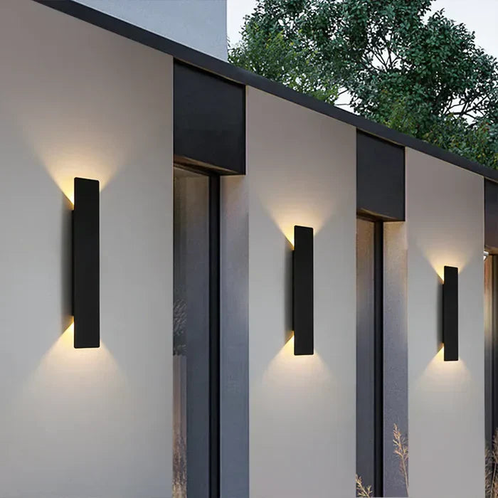 Modern StormGlow weather-resistant outdoor wall lamp, perfect for exterior home lighting. Durable patio or garden fixture.