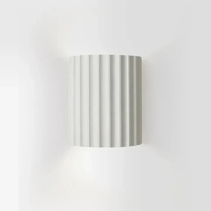 Modern wave design resin wall lamp for elegant home decor.