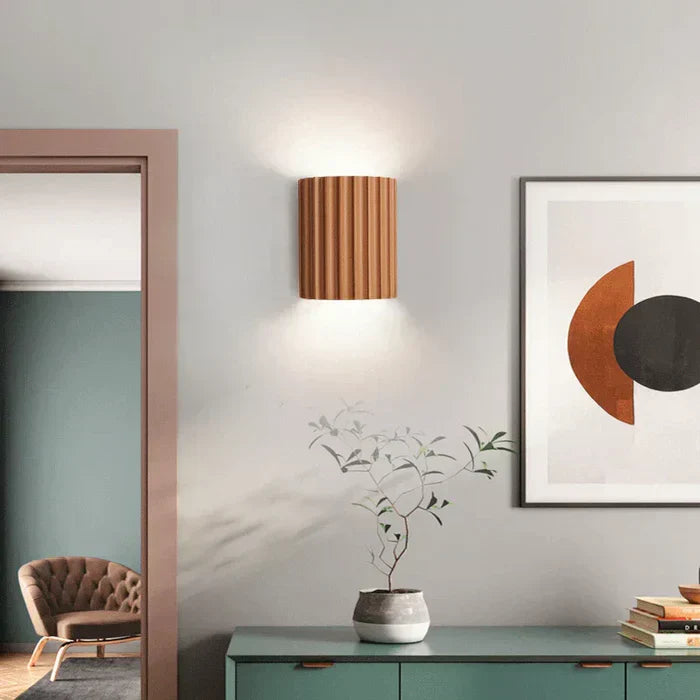 Handcrafted resin wall light, modern wave design, perfect for contemporary home decor.