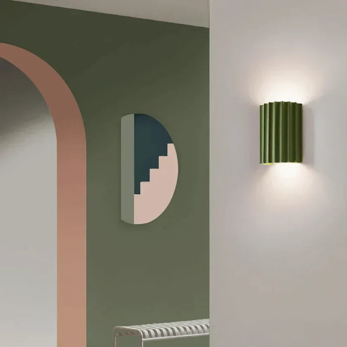 Modern artistic wave design wall lamp, offering soft ambient light for any room.