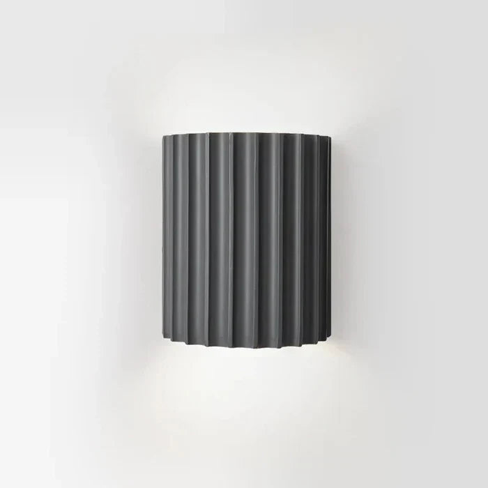 Unique modern wave resin wall lamp, an artistic LED light for sophisticated home decor.