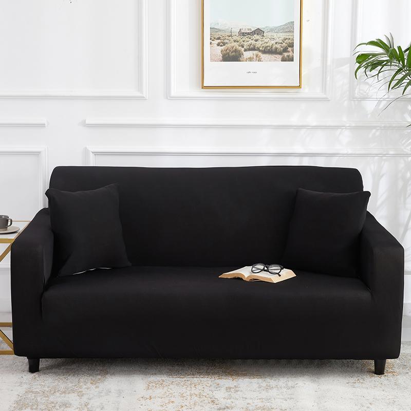 "Noir stretchable sofa cover in solid color, showcasing sleek fit and elegant style for versatile home decoration."
