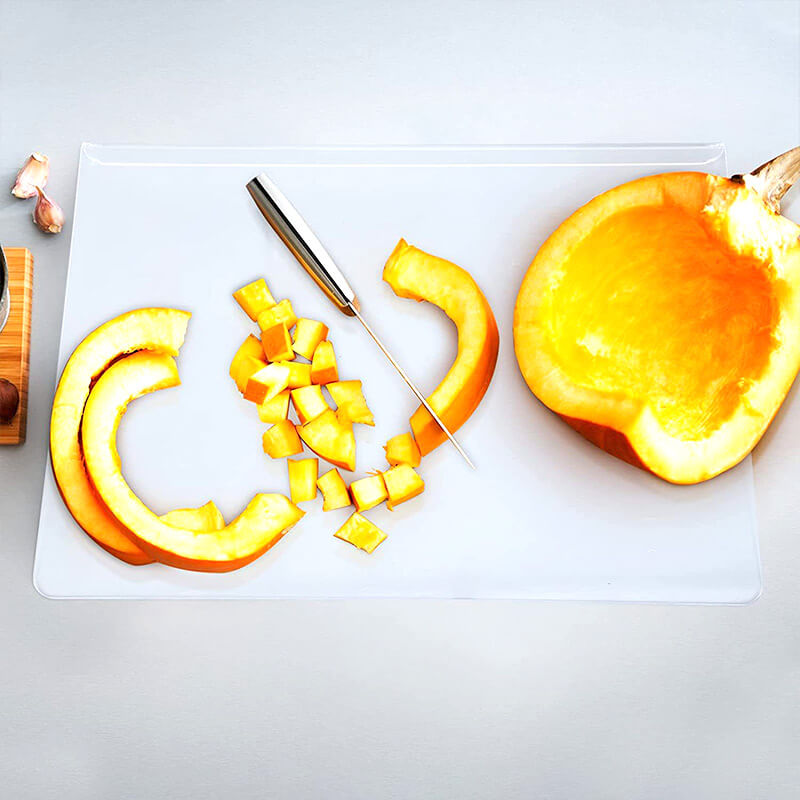 Stylish clear acrylic non-slip chopping board, perfect for modern kitchen food preparation & safety.