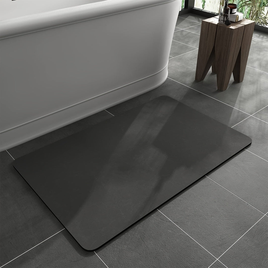 Quick-dry non-slip bath mat ensures bathroom safety. Absorbent diatomaceous earth floor mat for comfortable steps.