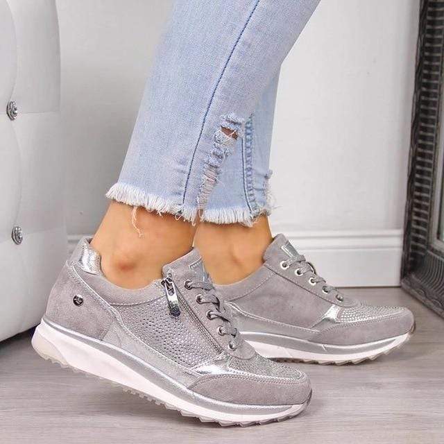Close-up of women's orthopedic walking shoes, bunion relief, featuring arch support