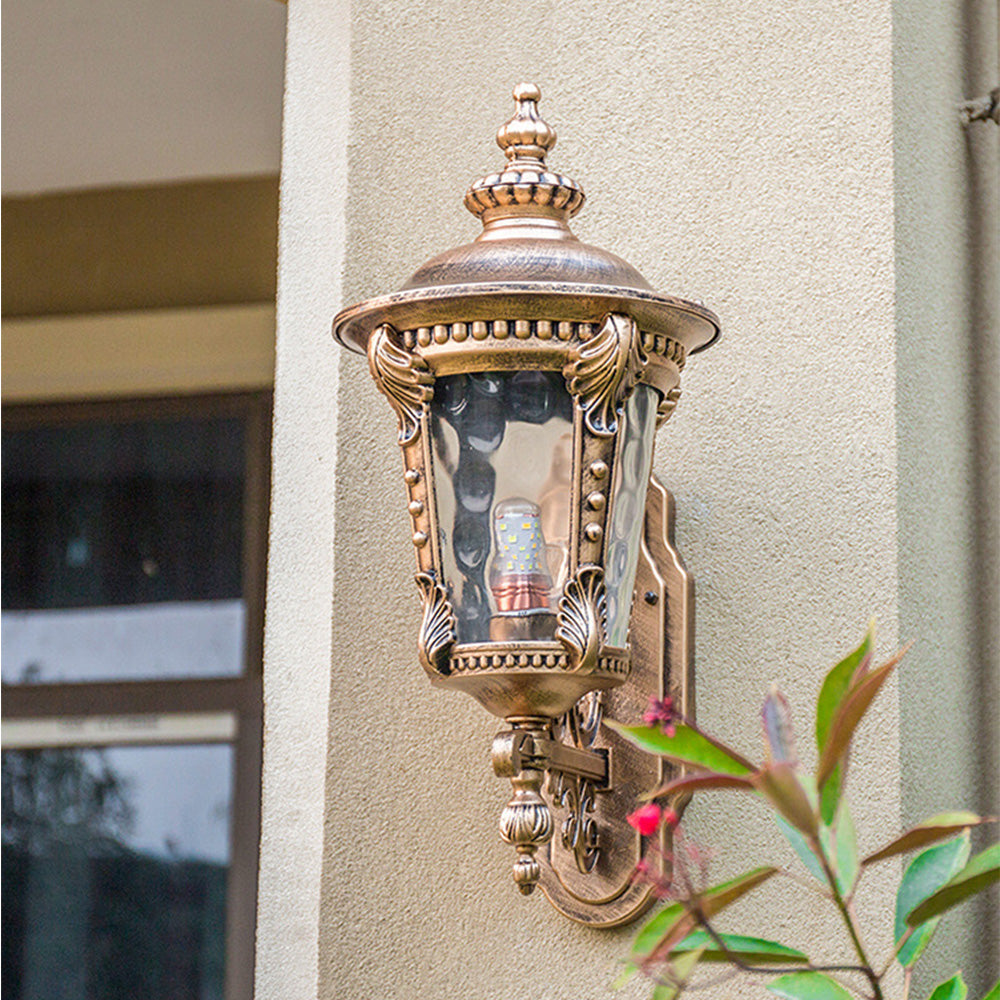 "Outdoor vintage glass wall lantern with aluminum frame, ideal for gardens, porches, providing warm and stylish ambiance."