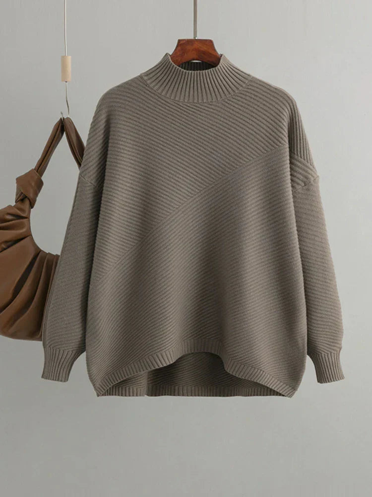 Oversized women's ribbed knit jumper in a classic style, perfect for casual everyday wear.
