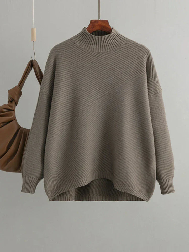 Oversized women's ribbed knit jumper in a classic style, perfect for casual everyday wear.