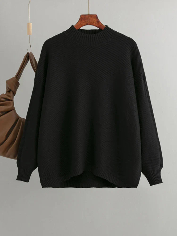 Black classic ribbed knit oversized women's pullover sweater, a comfortable and stylish everyday piece.