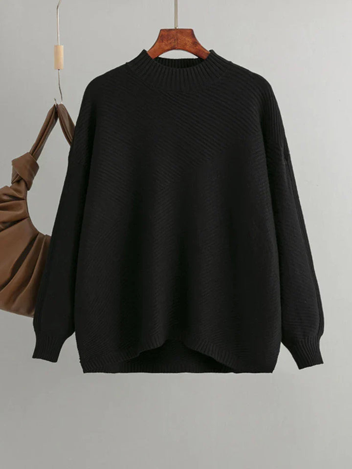 Black classic ribbed knit oversized women's pullover sweater, a comfortable and stylish everyday piece.