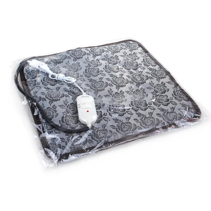 Pet warming electric mat with adjustable temperature and waterproof design, featuring a floral pattern and soft, plush surface for pet comfort.