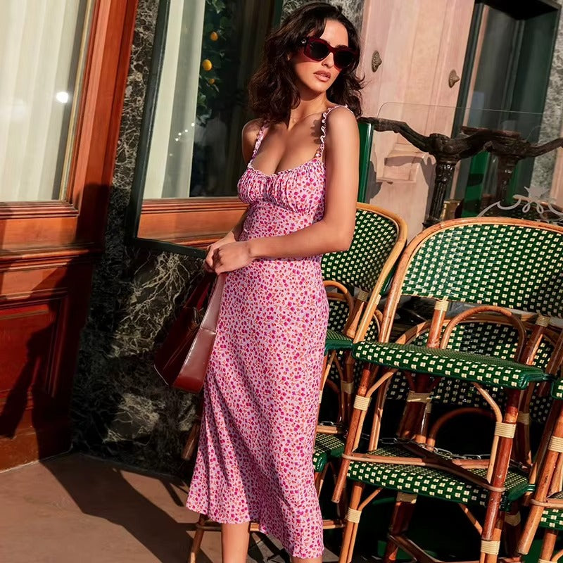 Vibrant pink floral print midi dress for women, featuring chic ruffle straps for summer.