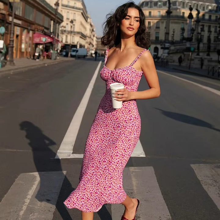 Women's pink floral ruffle strap midi dress. A stylish, elegant summer day dress for casual wear.