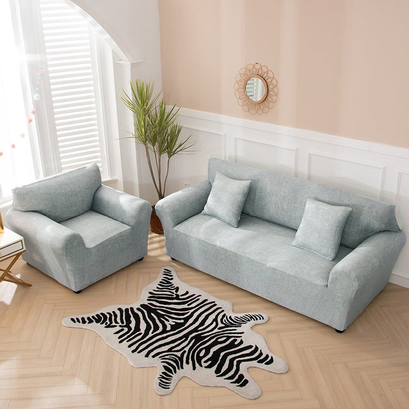 "Pistachio solid colour sofa cover, vibrant protective slipcover fits various sofa sizes, adds edgy style to living room."