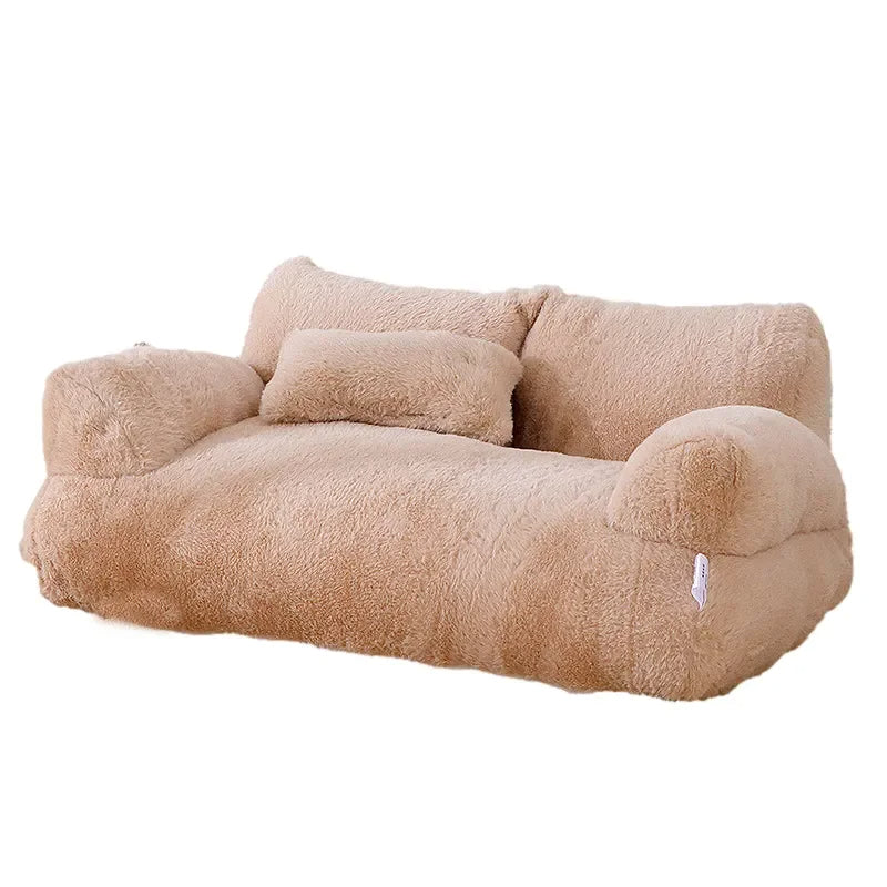 "Plush dog sofa bed in beige, features raised edges for security, soft cushioning for comfort, available in versatile sizes."