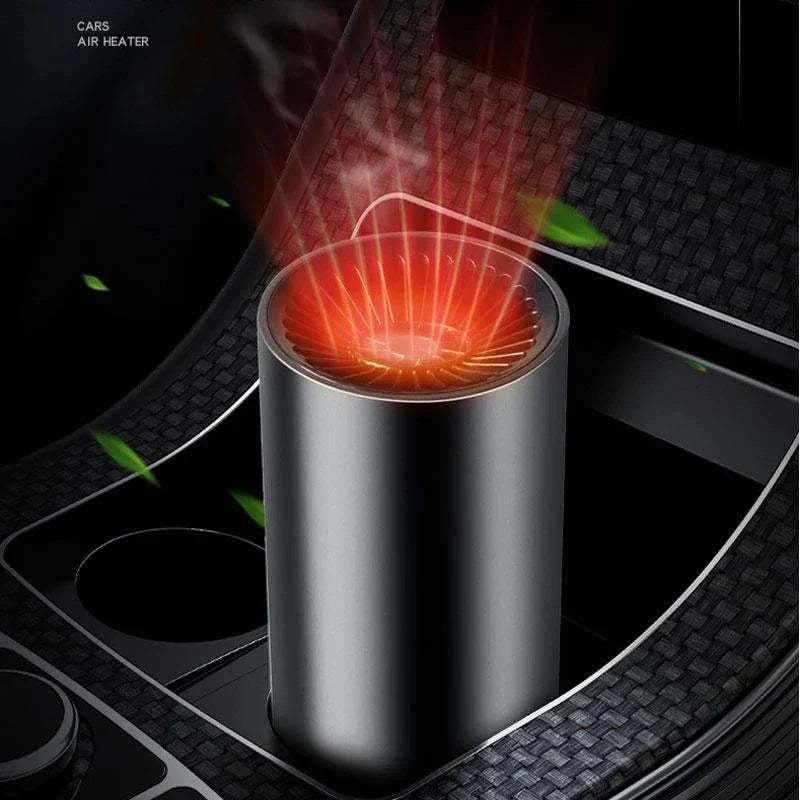 Hand adjusting a portable car heater, circulating warm air for fast winter defogging and vehicle comfort.