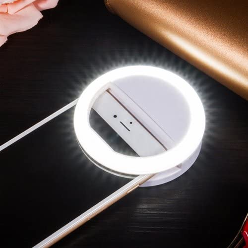 Compact clip-on LED ring light for smartphones, enhancing selfie and video quality.
