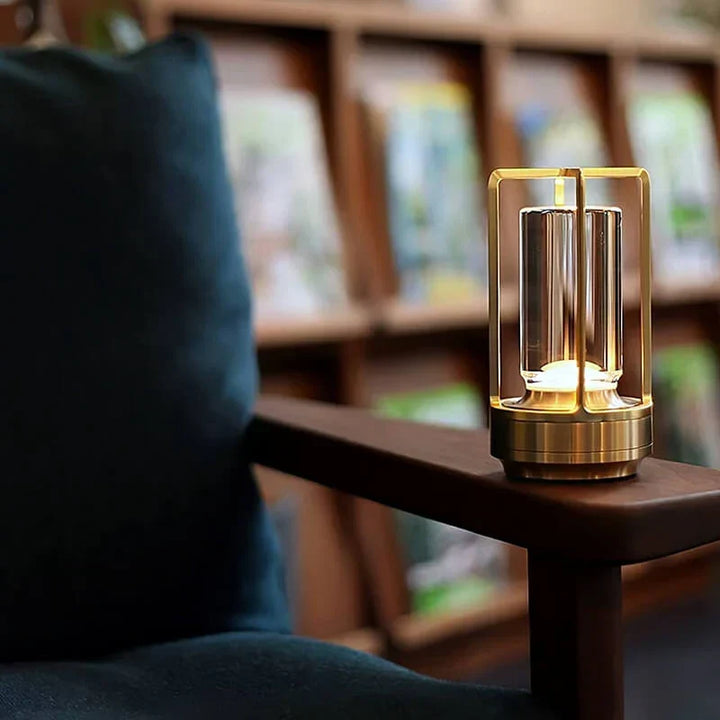 Close-up: Crystal LED table lamp showing intricate light refractions. Features touch control for brightness.
