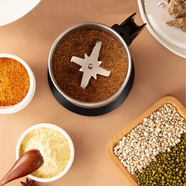 Sleek, portable electric grinder for food, coffee, spices, and herbs. Easy to use kitchen tool for daily cooking.