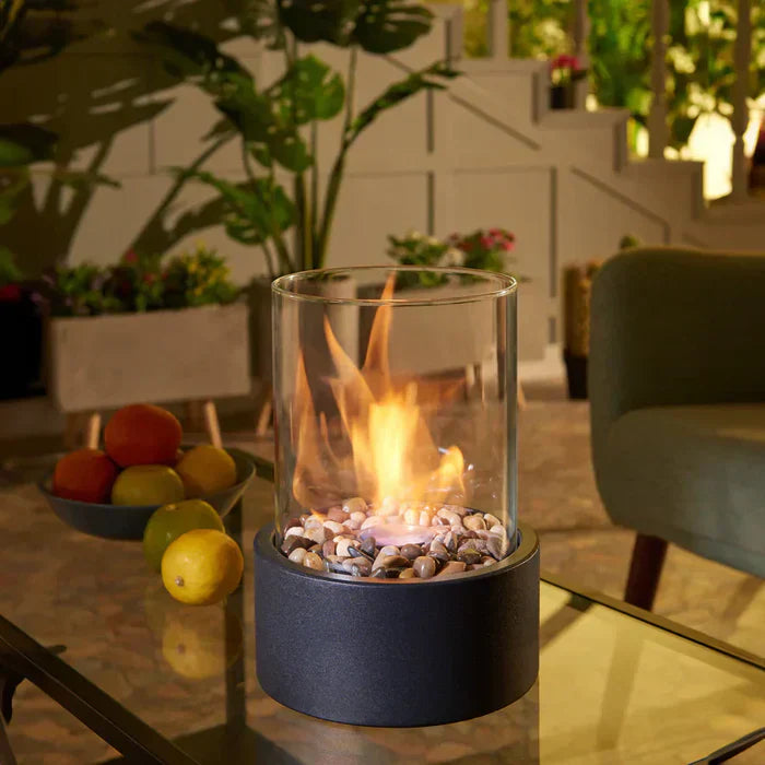 Portable tabletop fire pit with modern design, perfect for cozy indoor & outdoor ambiance.