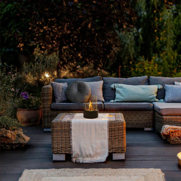 GlowLuxe portable lantern fire pit, creating a warm flame feature for any indoor or outdoor setting.
