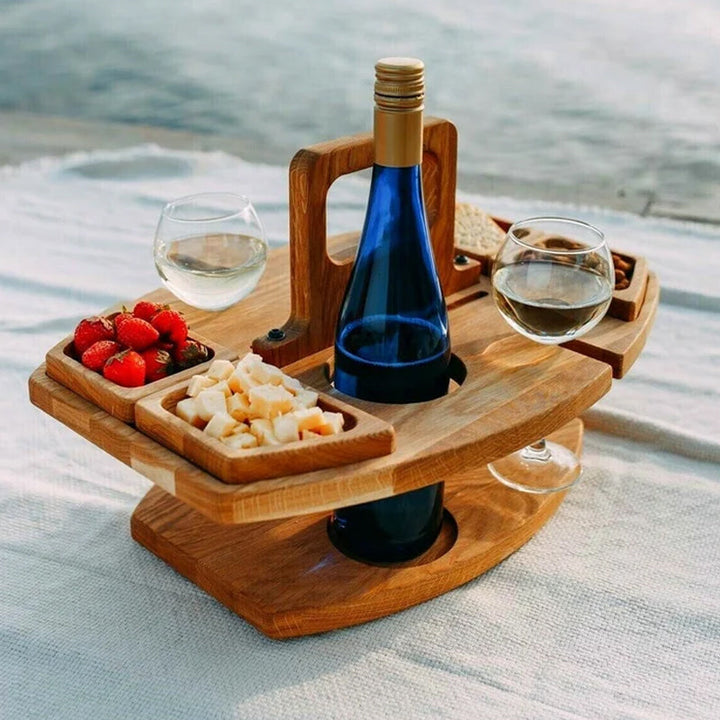 Portable wooden picnic wine table for outdoor serving. Foldable design perfect for travel, beach, park, or garden.