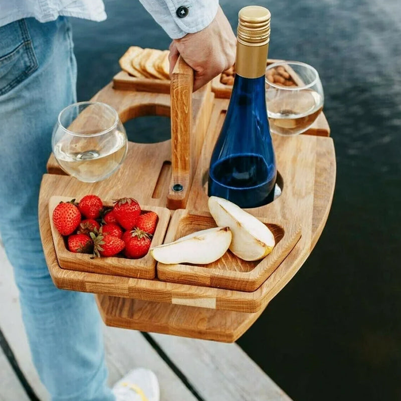 Folded portable wood picnic table, compact & lightweight for easy transport to park, beach, or garden.