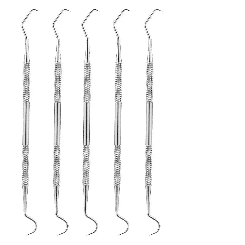 Close-up of a professional dental explorer tip, showing precision for detailed tooth cleaning.