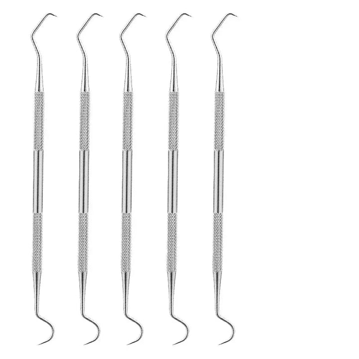Close-up of a professional dental explorer tip, showing precision for detailed tooth cleaning.
