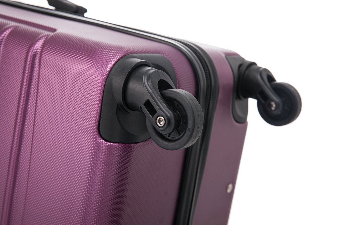 Modern purple 2-piece hard shell luggage set; functional rolling suitcases designed for convenient travel.