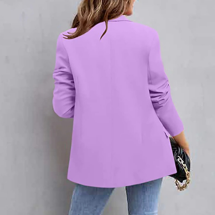 Modern purple women's blazer. Slim fit design for professional office wear, formal events, or trendy fashion.