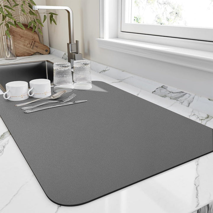 Absorbent kitchen mat protects countertops. Ideal quick-dry dish drainer for home goods.