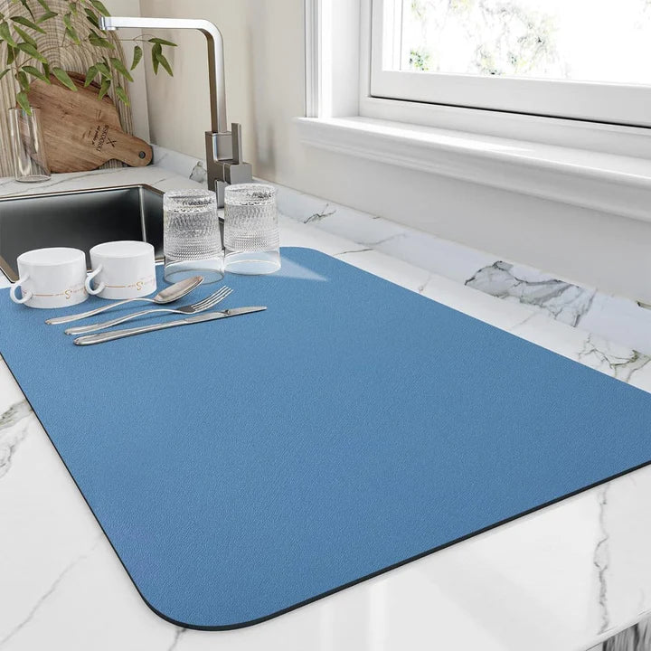 Compact quick-dry drying mat for dishes. Essential absorbent kitchen accessory.