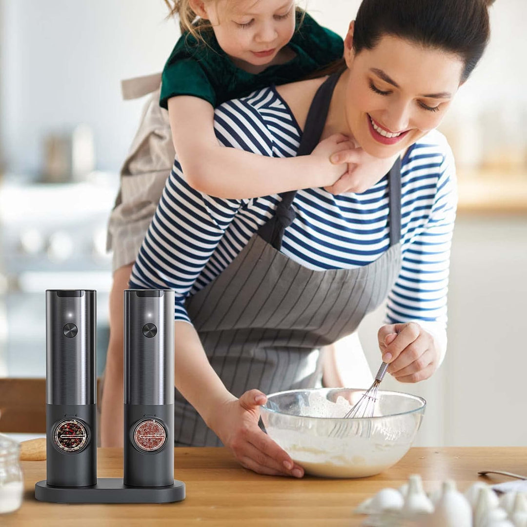 Hands-free rechargeable electric salt and pepper mills. Stainless steel, offers effortless seasoning for every meal.