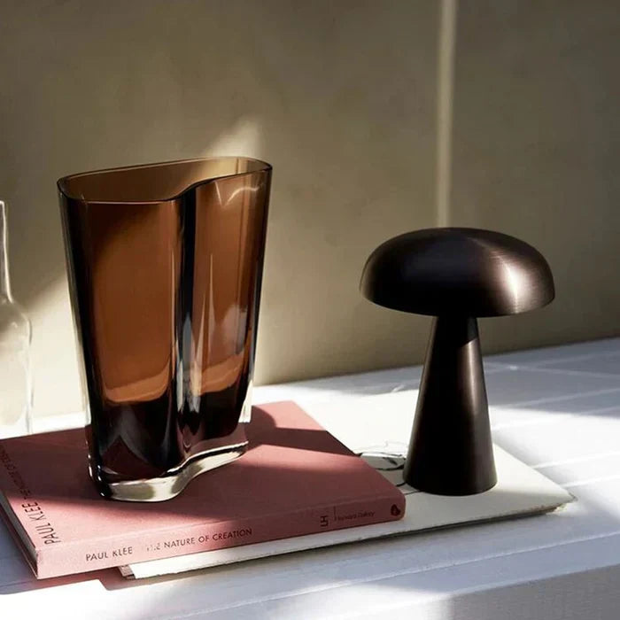 Detail of modern portable ShroomLite LED lamp, showcasing its elegant design & gentle ambient glow.