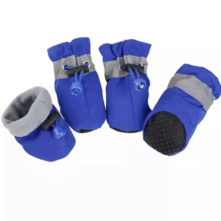 "Red winter dog boots with a non-slip sole, warm lining, and waterproof finish, perfect for cold, wet conditions."