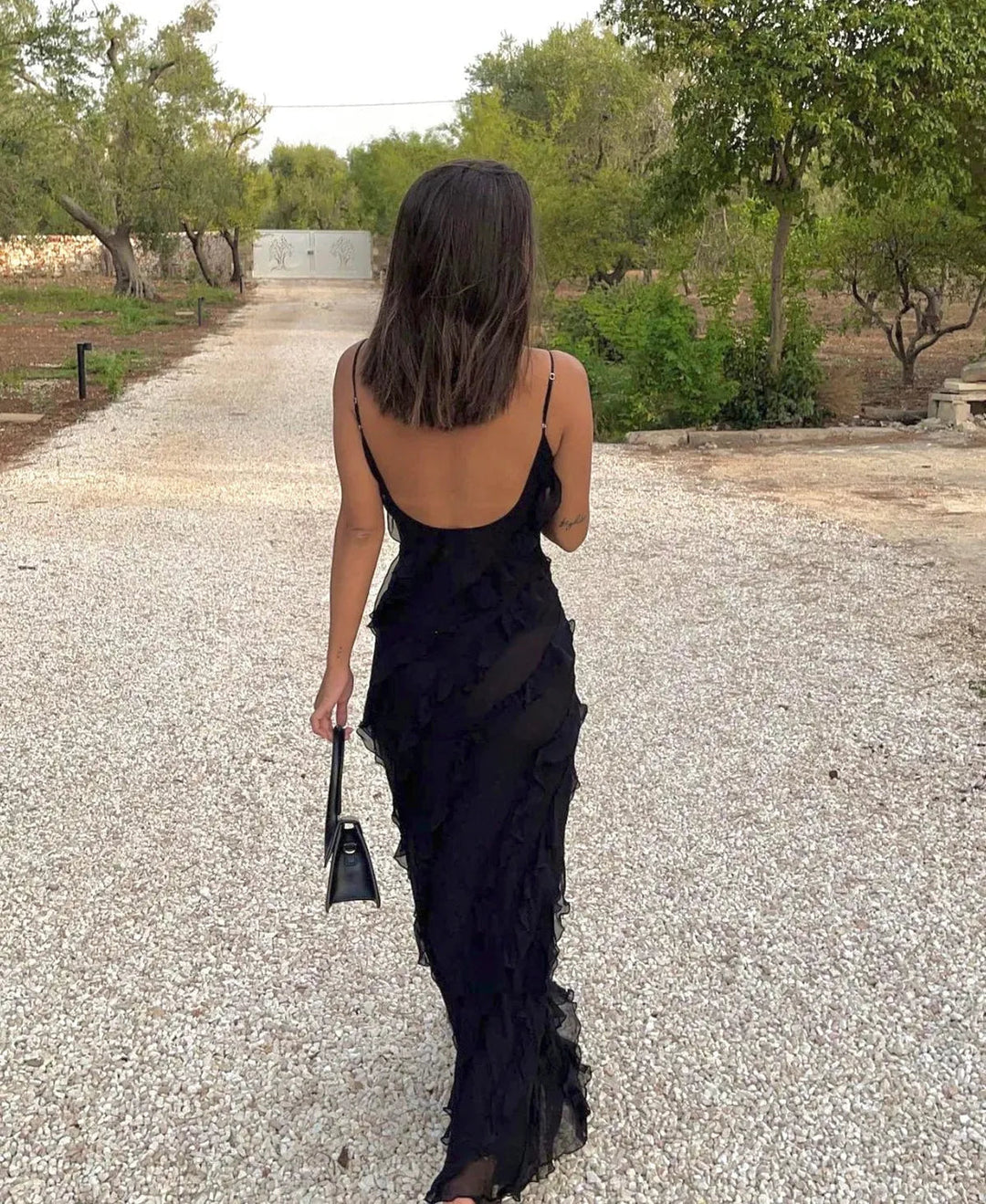 Stylish women's maxi dress with romantic ruffles, an elegant choice for evening & parties.