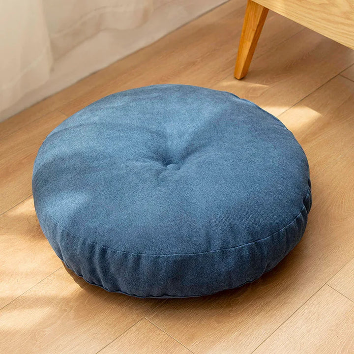 Round meditation cushion for comfortable floor seating, perfect for yoga, relaxation & mindfulness practices.