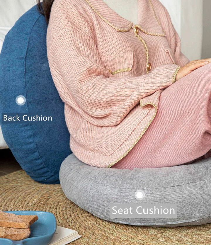 Soft round meditation cushion for comfortable floor seating, promoting relaxation and focus during yoga.