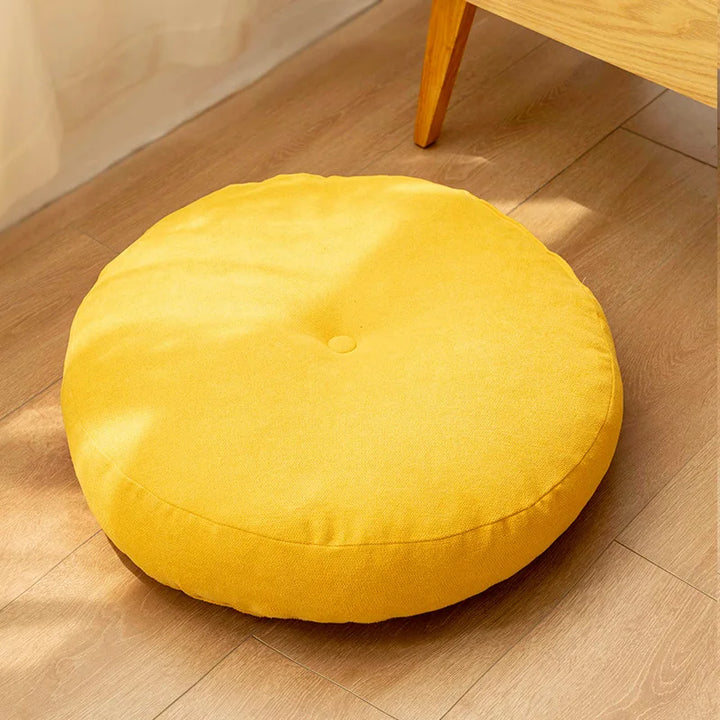 Stylish round meditation cushion for floor seating. Enhances home decor & supports yoga, mindfulness.