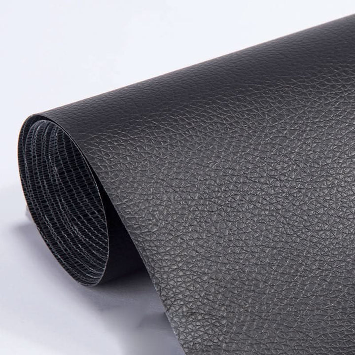 Self-adhesive leather & fabric repair patch for restoring car seats, sofas & torn bags.
